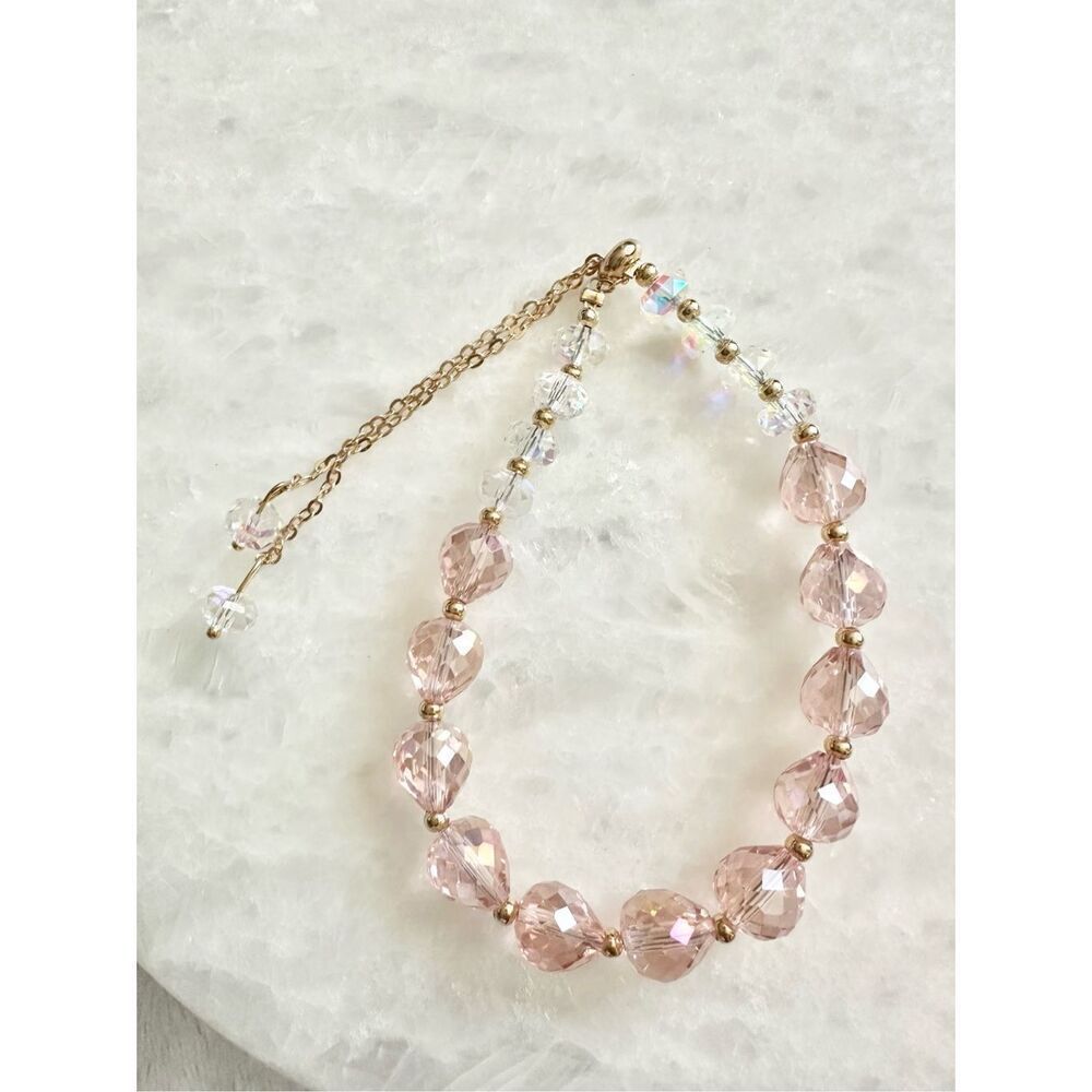 Bohemian style iridescent and light pink beaded friendship bracelet